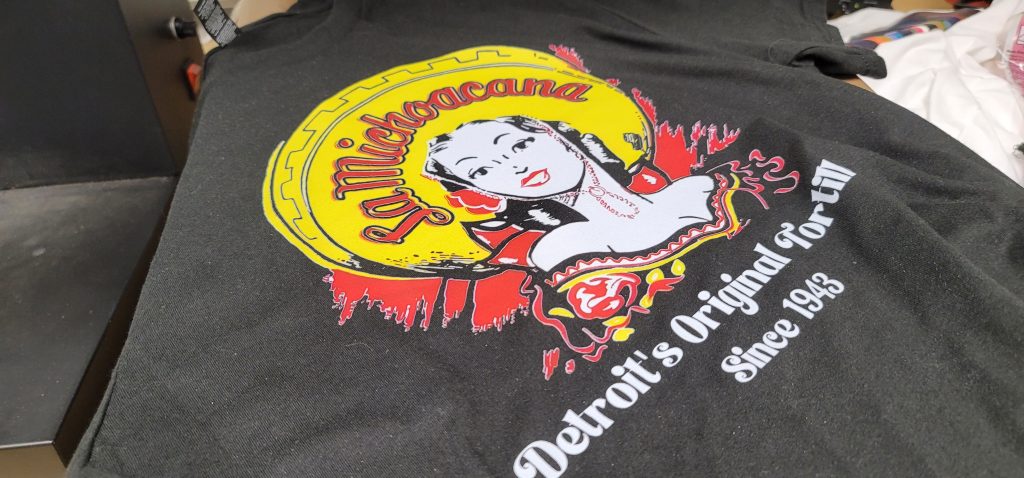 A run of custom printed shirts by Fan Club Shirts